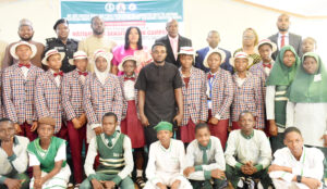 Pic.11. Chief Executive Officer, We love Nigeria Unity and Peace Initiative, Anaba Anthony (M); Spokesman, Economic Financial Crimes Commission, Dele Oyewale (3rd R); Provost, Nigerian Police Public Relations School, Dr Emmanuel Ojukwu (4th R); representative of the FCT Commissioner of Police, CP Uba Alkali (2nd L); and the Students during the inauguration of nationwide sensitisation campaign against internet fraud and cybercrime targeting young adult, teenagers and secondary school students organised by We Love Nigeria Unity and Peace Initiative in collaboration with the National Orientation Agency and the FCT Secondary Education Board in Abuja on Monday (22/9/25).
0235/ MON/SEP/22/9/2025/Deborah Bada/NAN