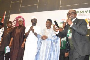 From left: Acting Permanent Secretary, Federal Ministry of Youth Development, Wole Joseph; Director General, National Institute for Legislative and Democratic Studies, Prof. Abubakar Sulaiman; Minister of Youth Development, Comrade Ayodele Olawande; Chairman, Senate Committee on Youth Development, Sen. Yemi Adaramodu; and the Executive Director, Mind The_Gap, Tayo Olosunde, during the 2025 Africa/ National Youth Day celebration organised by the FMYD in collaboration with Mind the_Gap in Abuja on Thursday (27/11/25).