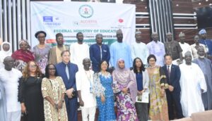 Minister of State for Education, Prof. Suwaiba Ahmad (6th R); Vice chancellor, Federal Provost College of Education, Kontagora, Niger State, Prof. Faruk Haruna (2nd R); Charge D'affaires, Embassy of Japan, Mr Hitoshi Kozaki(3rd); and others participants, during the handing over of the  ICT equipment to 15 Federal and State Colleges of Education by the Federal Ministry of Education (FME) in collaboration with the Government of Japan and UNESCO-IICBA in Abuja on Tuesday (2/6/26). 