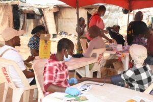 Health officials attending to patients of new kuchingoro Internally Displaced Persons (IDPs), during a free medical outreach organised by Oneworld Initiative for sustainable development in collaboration with National Commission for Refugees, Migrants and Internally Displaced Persons in Abuja